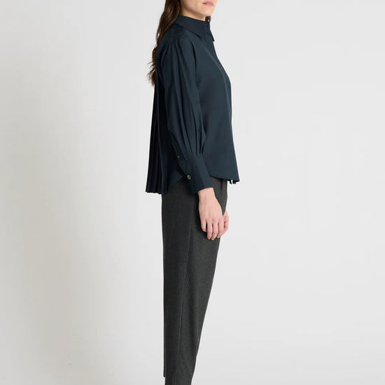 dark navy shirt with concealed placket and pleated rear side view
