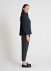 dark navy shirt with concealed placket and pleated rear side view