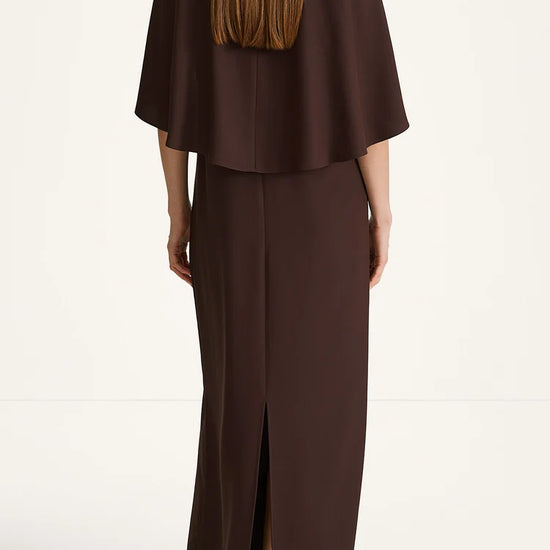 Brown cape and skirt set on a white background