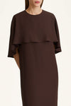 Brown dress with a layered design on a white background