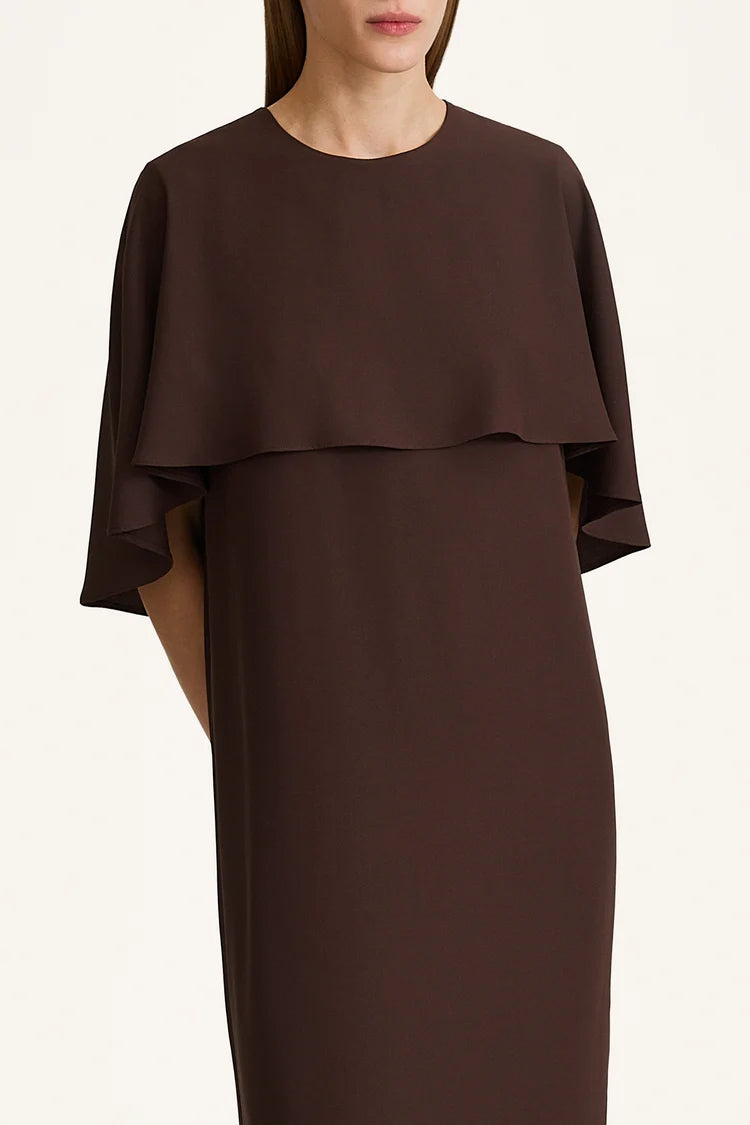 Brown dress with a layered design on a white background