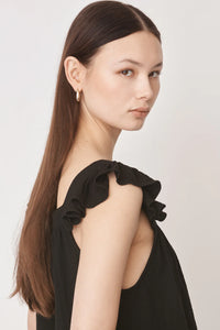Ruffle capped sleeved top with square neck and backline in textured waffle like black fabric
