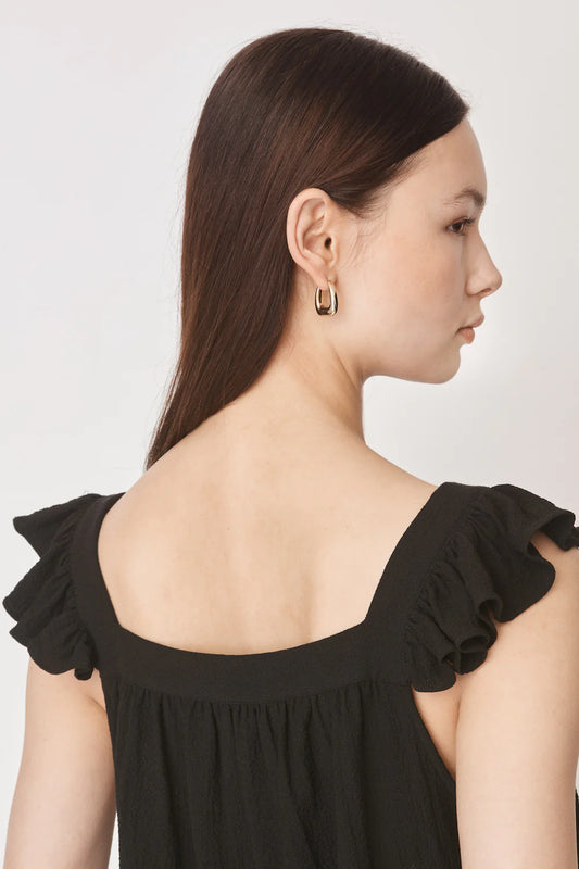 Ruffle capped sleeved top with square neck and backline in textured waffle like black fabric