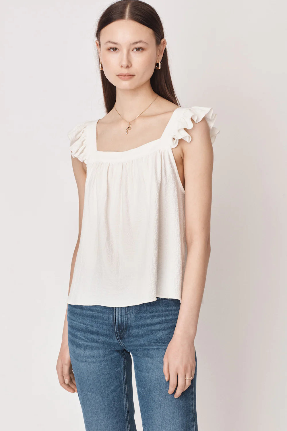 Ruffle capped sleeved top with square neck and backline in textured waffle like white ecru fabric