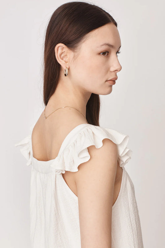 Ruffle capped sleeved top with square neck and backline in textured waffle like white ecru fabric