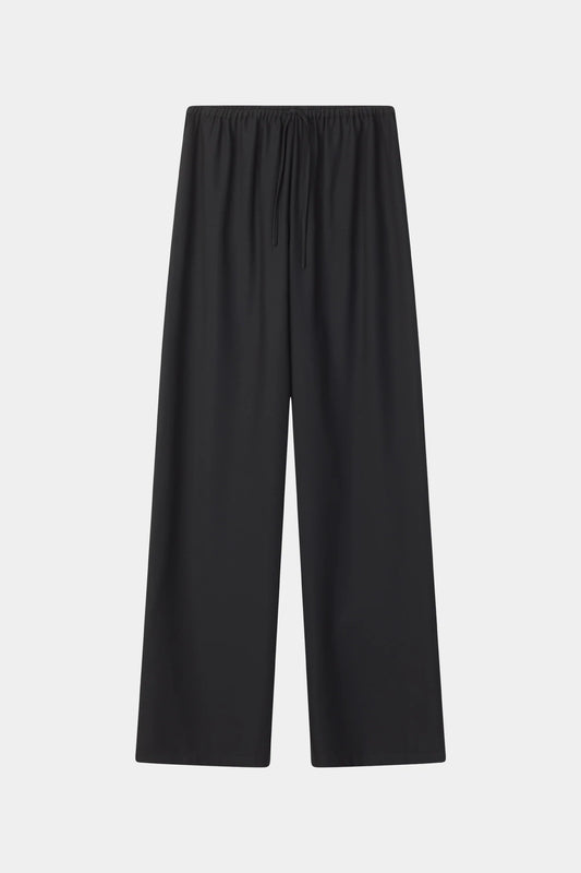 Black wide-leg cropped pants with an elastic waistband and drawstring, shown flat against a light gray background.