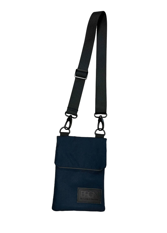 navy cross body bag on a white background 