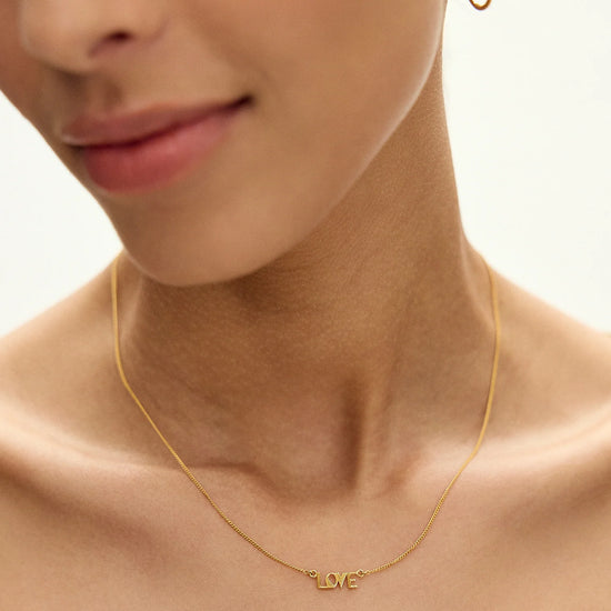 love retro inspired gold necklace from rachel jackson model shot