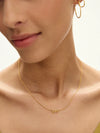 love retro inspired gold necklace from rachel jackson model shot