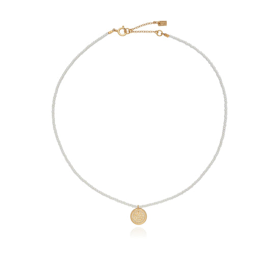 small pearl beaded necklace with gold circular charm