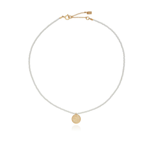 small pearl beaded necklace with gold circular charm