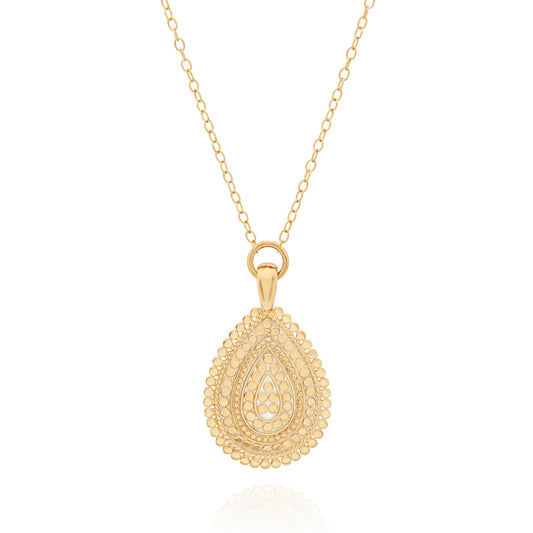 Teardrop shaped pendant gold necklace with gold dot details