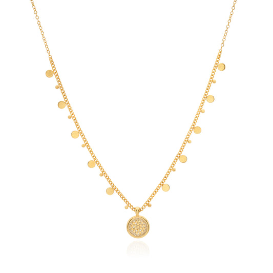 Gold plated necklace with circle charm and charms running along the chain