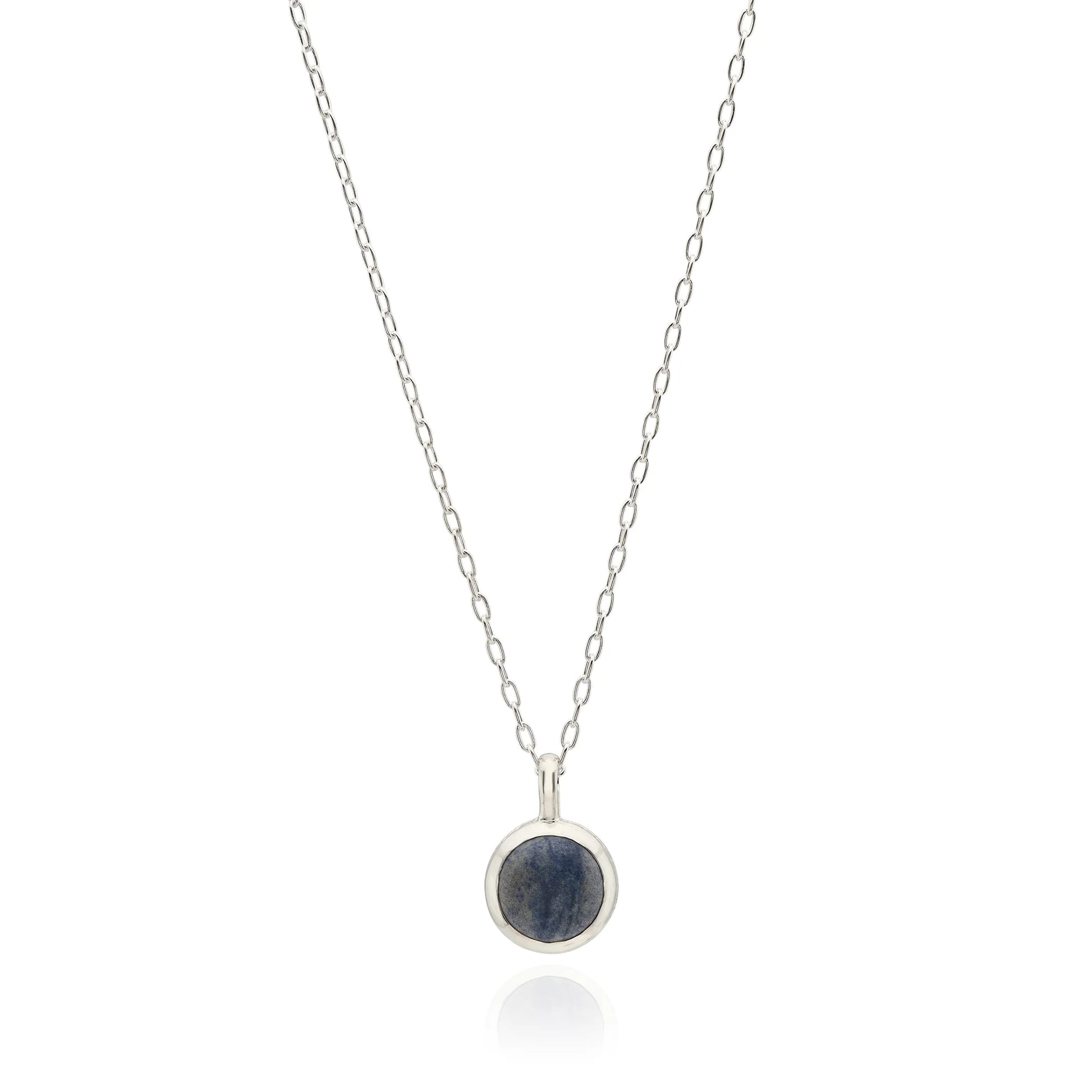 Sterling silver circular pendant necklace with blue stone and dot work