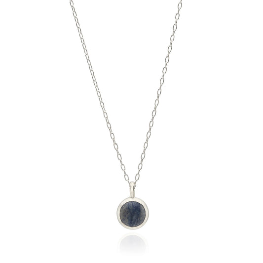 Sterling silver circular pendant necklace with blue stone and dot work