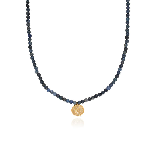 Blue beaded necklace with gold plated circular charm