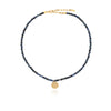 Blue beaded necklace with gold plated sterling silver charm