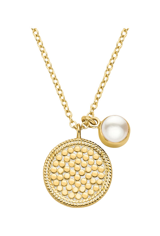dotted gold circular pendant necklace with single pearl charm