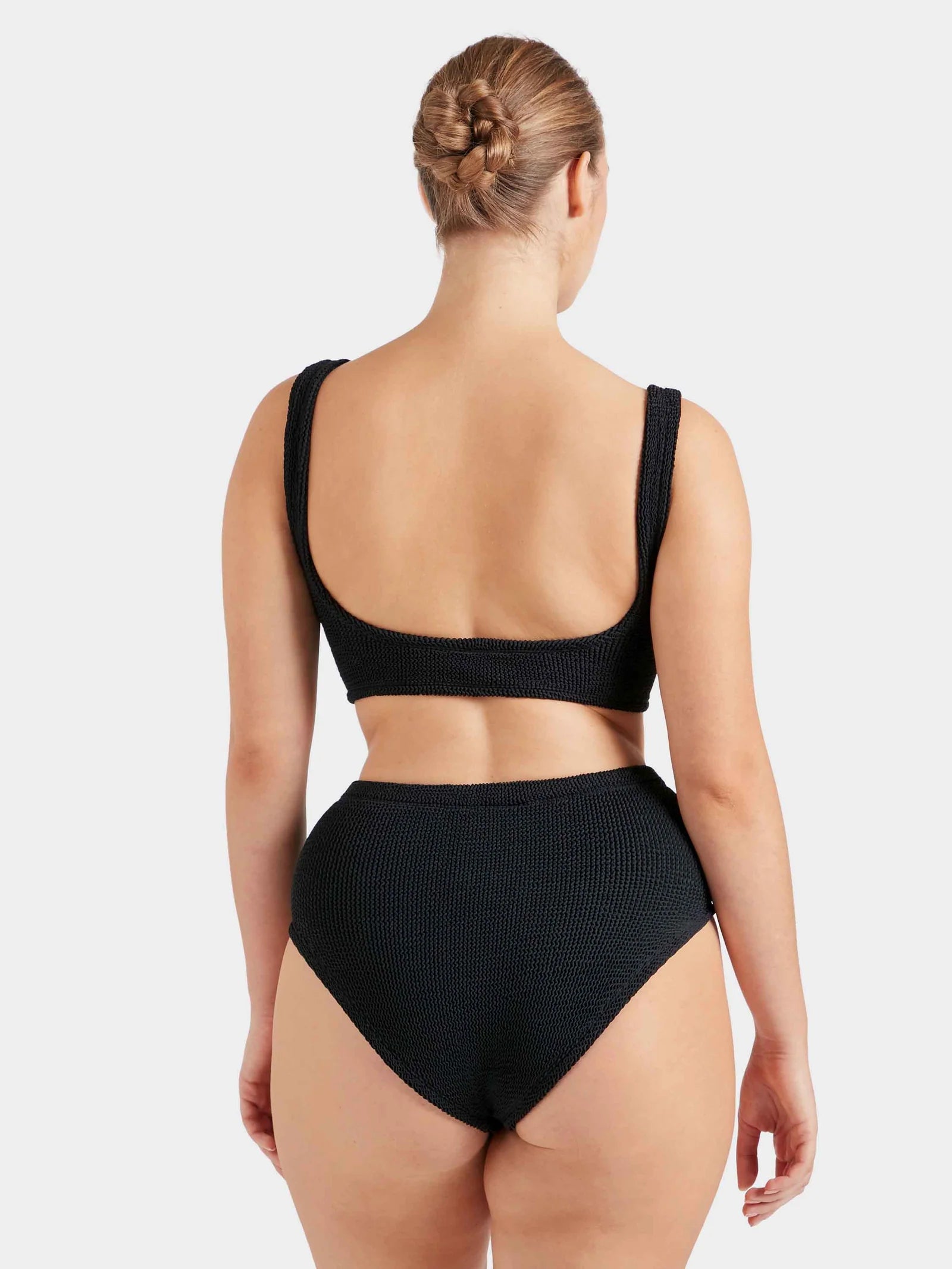 black crinkle bikini with hoop at the bust and high rise bottoms from hunza g rear view