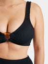 black crinkle bikini with hoop at the bust and high rise bottoms from hunza g close up of bust