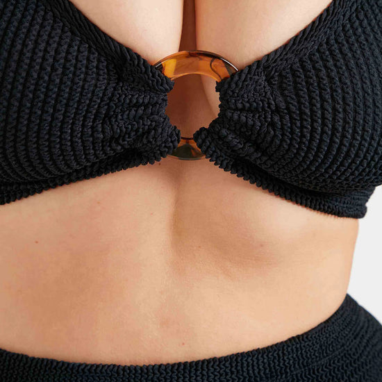 black crinkle bikini with hoop at the bust and high rise bottoms from hunza g close up