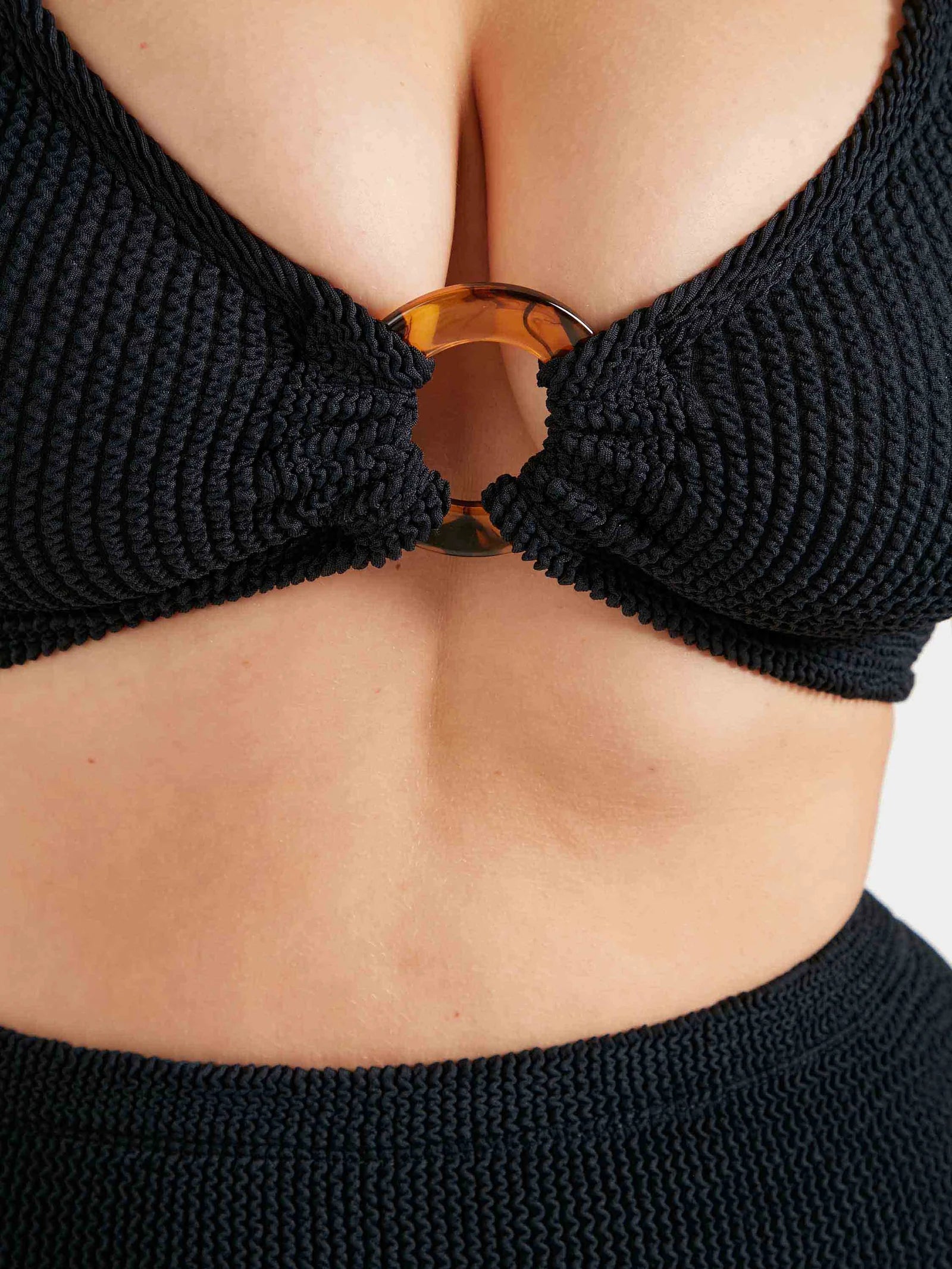black crinkle bikini with hoop at the bust and high rise bottoms from hunza g close up