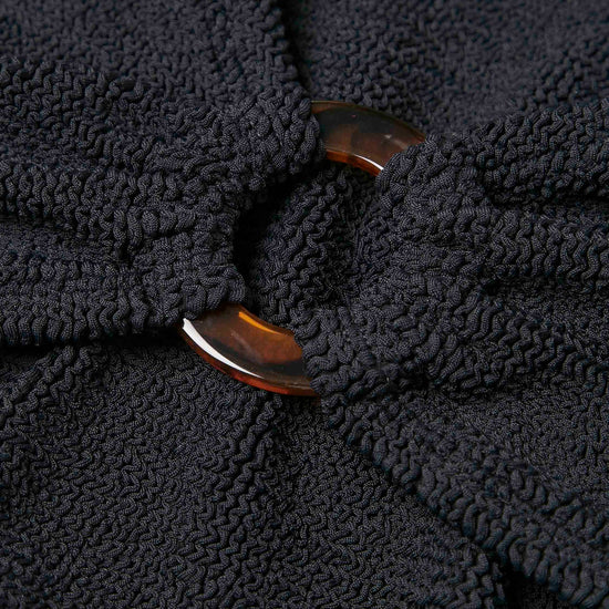 black crinkle bikini with hoop at the bust and high rise bottoms from hunza g close up of fabric