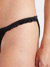 Black bikini from Hunza G bottom on a person against a neutral background