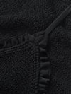 Close-up of a textured black fabric from a Hunza G bikini