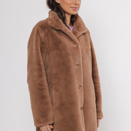 faux fur tan coat  side view 