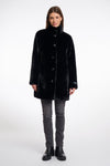 faux fur coat with high neck, black buttons and length just above the knee 