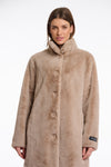 longer line beige faux fur coat with stand collar and large buttons from rino and pelle close up