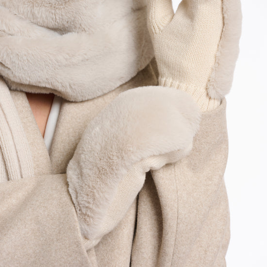 beige knitted mittens with faux fur on top side model shot