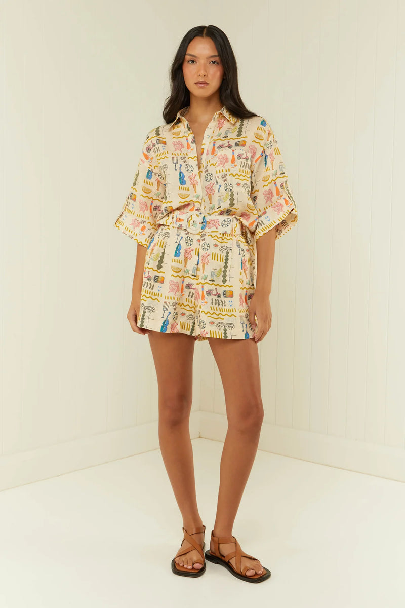 Printed linen shorts with a removable matching belt model shot with matching shirt