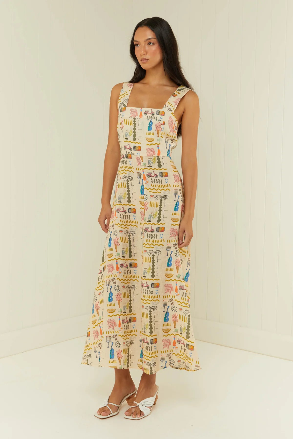 Linen summer dress in Italian inspired print with a fitted bodice and A line skirt