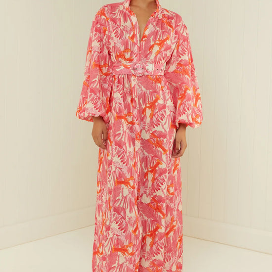 pink lobster print linen midi dress with long puff sleeves and belted waist model shot 