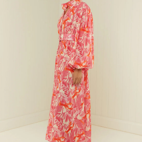 pink lobster print linen midi dress with long puff sleeves and belted waist  side view 