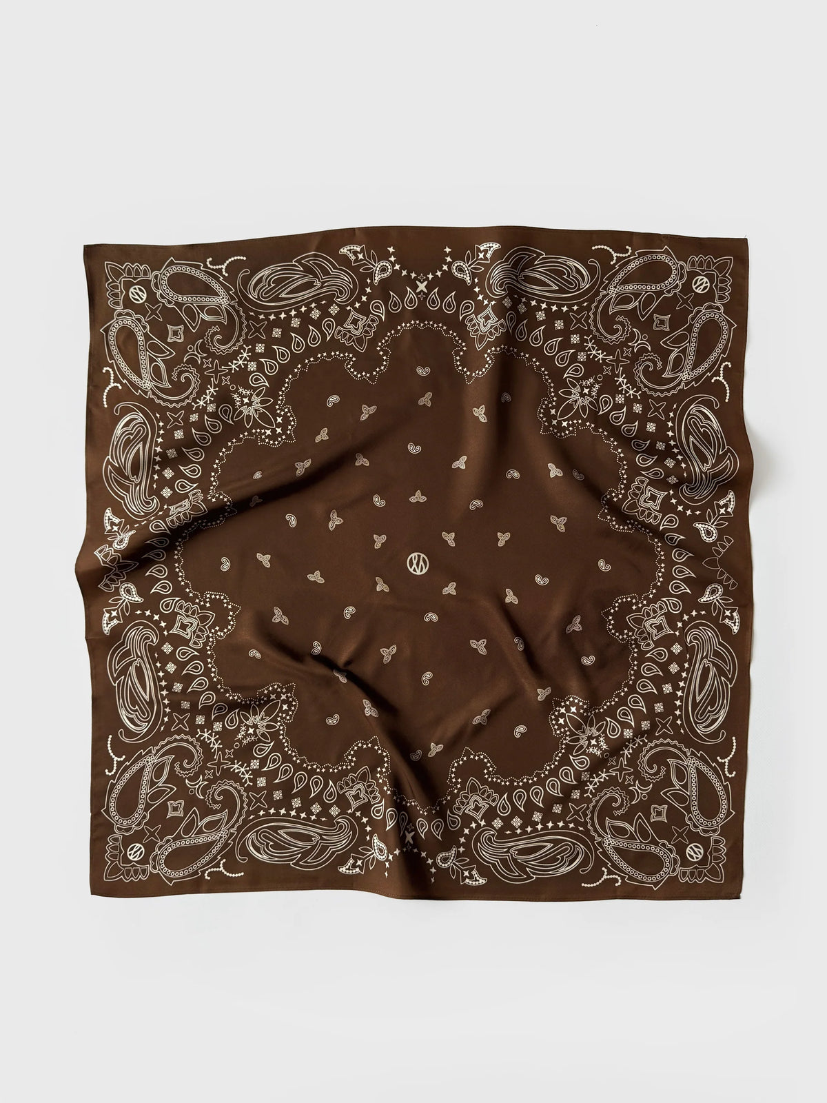 A square brown bandana featuring a classic paisley pattern in light beige, laid flat on a light gray background.