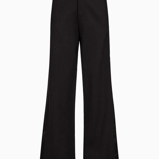 Black wide-leg pants on a white background from Pieszak