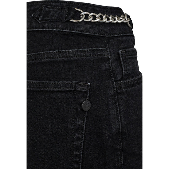 Black jeans with a chain detail on a white background