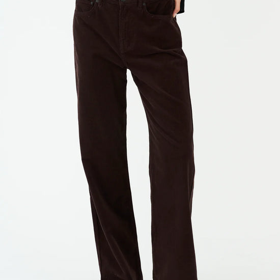 straight leg corduroy dark brown jeans with mid rise  model shot