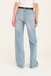 Rear view of pale wash denim on model