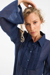semi sheer blue pintuck shirt from pieszak close up