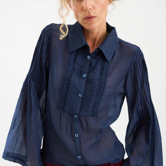 semi sheer blue pintuck shirt from pieszak model shot