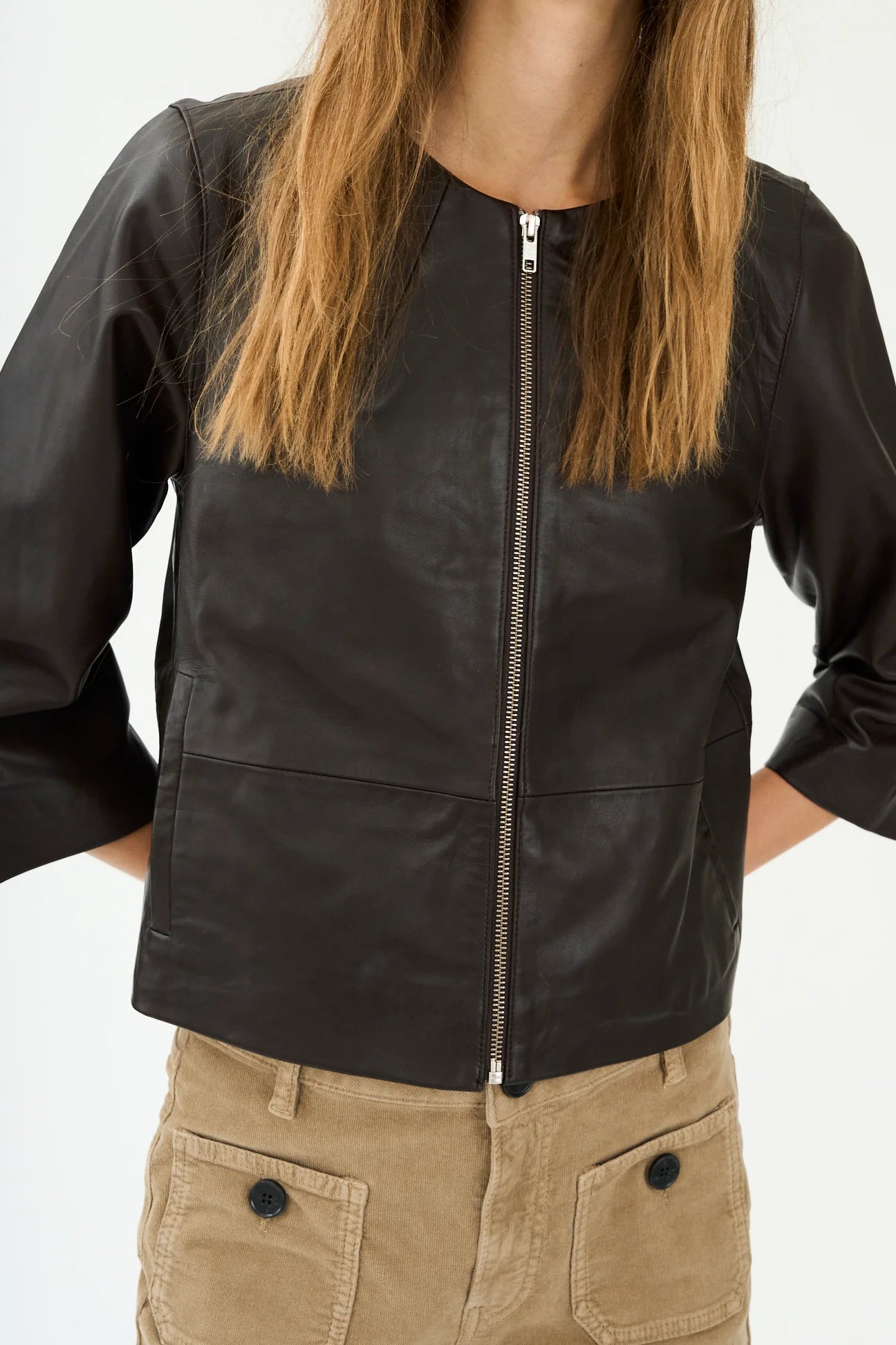 round neck dark brown leather jacket  model shot
