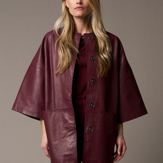 half sleeve concealed placket burgundy leather jacket from pieszak model shot