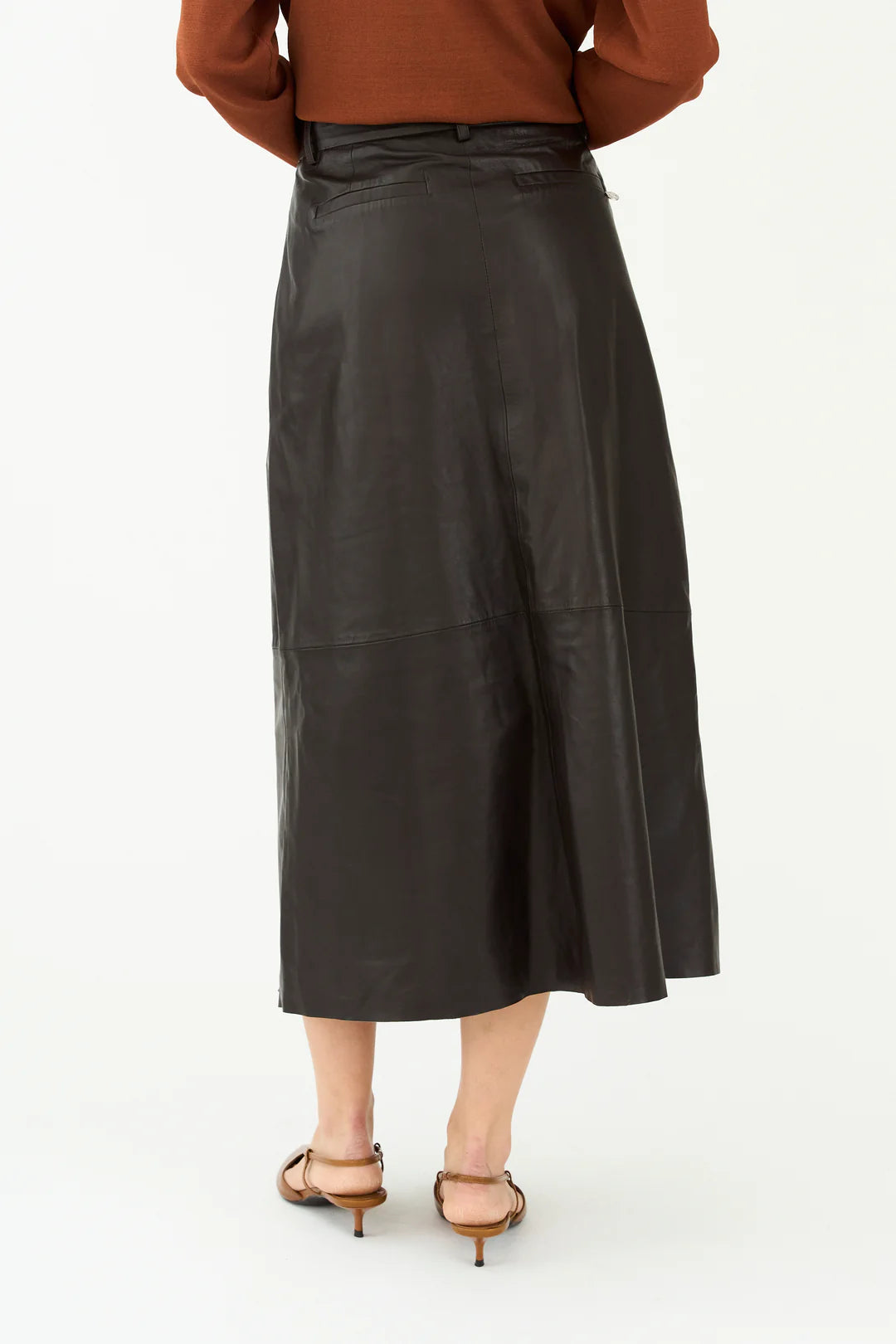 mid length chocolate brown leather pleated skirt with belt loops rear view