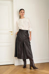 mid length chocolate brown leather pleated skirt with belt loops model shot