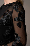 black mesh sheer blouse with fitted bodice and embroidered floral stitching from pieszak  model shot close up