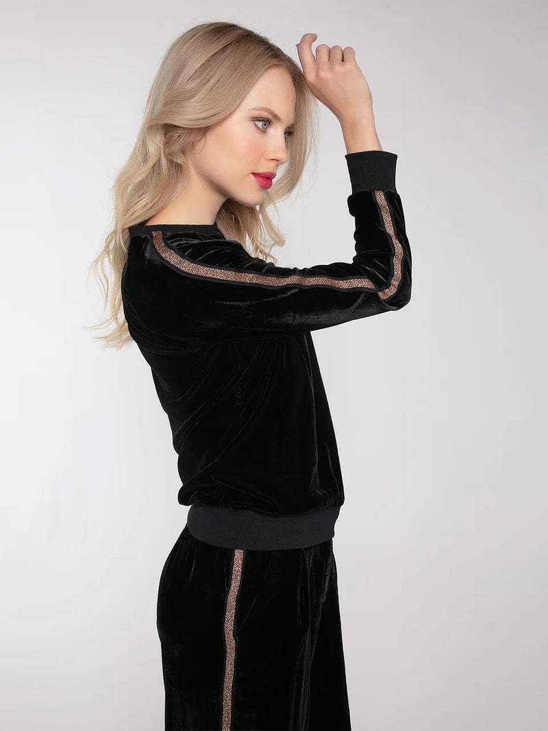 Black velvet sweatshirt with gold stripe down the arms and ribbed collar cuffs and hem